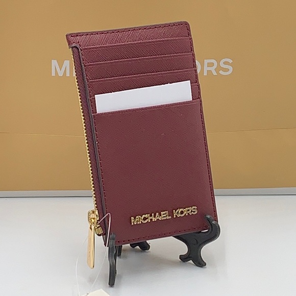 Michael Kors Jet Set Travel Medium Top Zip Card
Case Wallet
Dark Sherry color - Picture 6 of 11